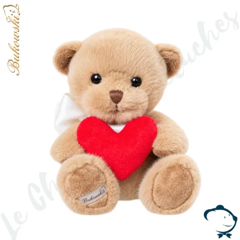 Peluche ours My Love Bukowski 18 cm au pelage beige miel tenant un grand cœur rouge.