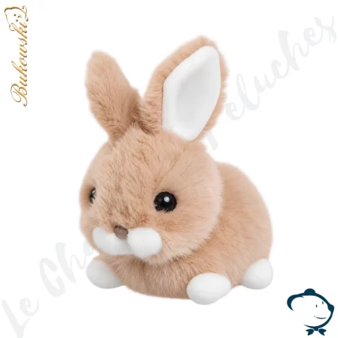 Peluche lapin Hera Bukowski 15 cm au pelage taupe extrêmement doux avec oreilles dressées et petites pattes blanches.