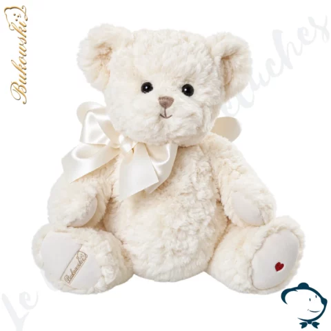 Peluche ours Janusz My Guardian Angel Bukowski 35 cm au pelage blanc, avec ailes d’ange, nœud en satin et cœur rouge brodé.